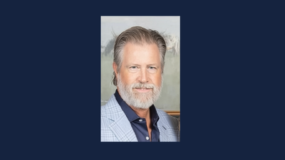 headshot of John Winniford, President of First America Homes